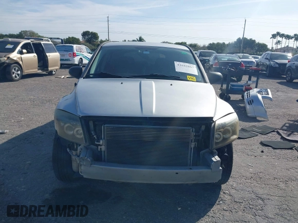 2009 Dodge Caliber SXT with VIN 1B3HB48A39D142674, listed as a IAAI auction lot 41642867 with 156,504 mi miles and . Bid and sale history available at carsss.com. Image 6.