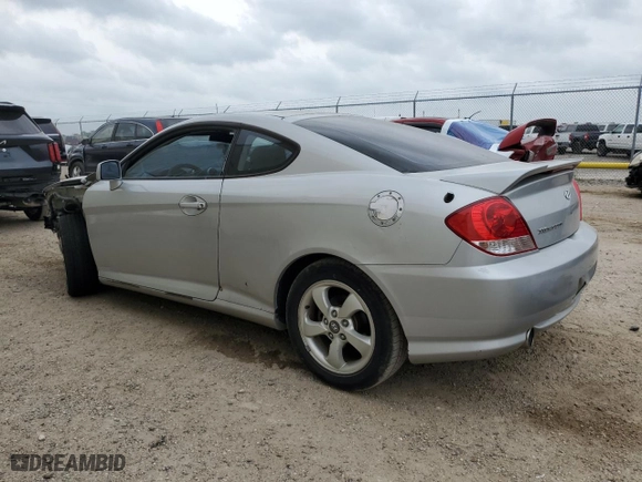 2006 Hyundai Tiburon GS with VIN KMHHM65D76U223977, listed as a Copart auction lot 50953134 with 41,078 mi miles and Salvage Title. Bid and sale history available at carsss.com. Image 2.