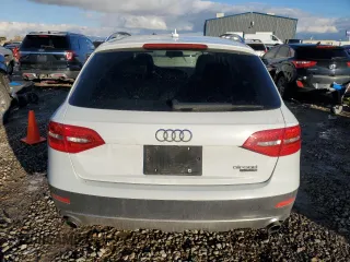 2016 Audi allroad Premium Plus with VIN WA1UFAFL9GA015036, listed as a Copart auction lot 82052924 with 98,625 mi miles and Salvage Title. Bid and sale history available at carsss.com. Image 6.