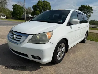 2010 Honda Odyssey Touring with VIN 5FNRL3H94AB047330, listed as a Copart auction lot 54064195 with 193,979 mi miles and Clean Title. Bid and sale history available at carsss.com. Image 2.