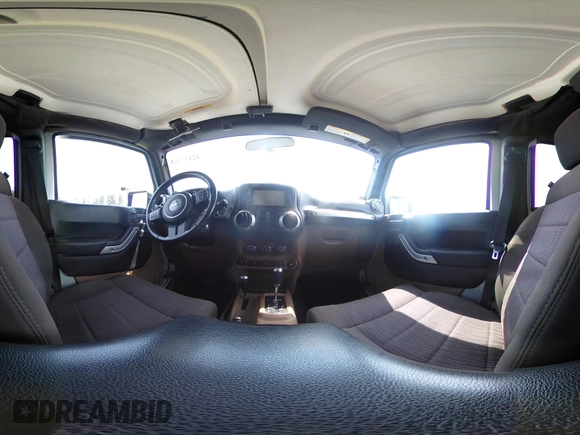2012 Jeep Wrangler Unlimited Altitude with VIN 1C4HJWEG2CL140059, listed as a IAAI auction lot 42433563 with 189,868 mi miles and . Bid and sale history available at DreamBid. Image 18.