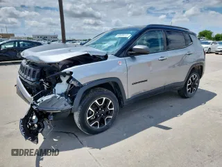 2020 Jeep Compass Trailhawk with VIN 3C4NJDDB0LT207825, listed as a Copart auction lot 63699915 with 58,190 mi miles and Salvage title. Bid and sale history available at DreamBid. Image 1.