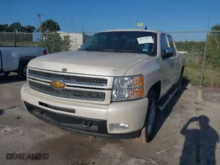 2013 Chevrolet Silverado 1500 LTZ with VIN 3GCPKTE76DG268911, listed as a IAAI auction lot 41977057 with 123,641 mi miles. Bid and sale history available at carsss.com. Image 2.