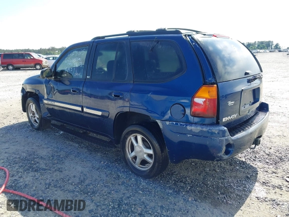 2003 GMC Envoy SLE z VIN 1GKDS13S032346173, wystawiony jako IAAI lot #42142925 z przebiegiem 304 447 mil mil oraz . Historia ofert i sprzedaży dostępna na DreamBid. Obrazek 3.