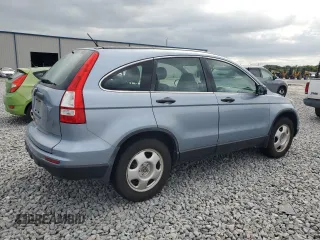 2010 Honda CR-V LX with VIN 5J6RE3H35AL020263, listed as a Copart auction lot 62840615 with 122,945 mi miles and Salvage title. Bid and sale history available at DreamBid. Image 3.