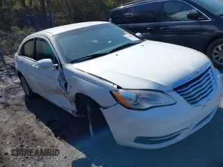 2014 Chrysler 200 LX with VIN 1C3CCBAB2EN208735, listed as a IAAI auction lot 41623000 with 104,819 mi miles and . Bid and sale history available at carsss.com. Image 1.