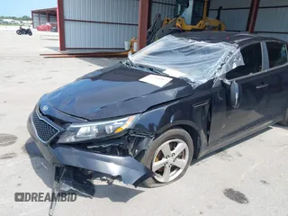2014 Kia Optima LX z VIN 5XXGM4A77EG322243, wystawiony jako IAAI lot #42334987 z przebiegiem 141 068 mil mil oraz . Historia ofert i sprzedaży dostępna na DreamBid. Obrazek 12.