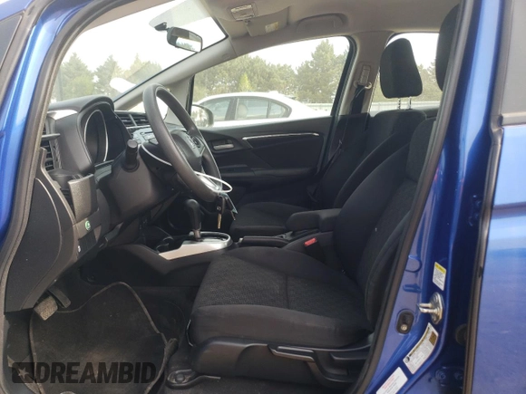 2015 Honda Fit LX с VIN 3HGGK5H57FM725785, выставлен на аукционе Copart как лот 54344325 с пробегом 76 849 миль миль и Списание • Salvage title. История ставок и продаж доступна на DreamBid. Изображение 7.