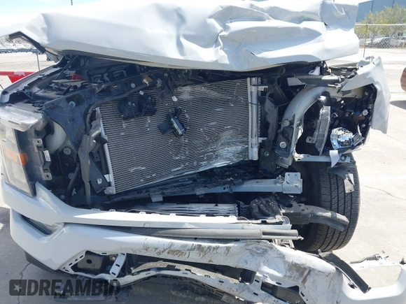 2023 Ford F-150 XL with VIN 1FTEW1CP2PKE60004, listed as a IAAI auction lot 41982176 with 17,900 mi miles and . Bid and sale history available at DreamBid. Image 6.