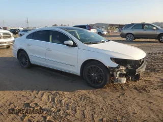2014 Volkswagen CC VR6 Executive 4Motion with VIN WVWGU7AN3EE529054, listed as a Copart auction lot 84469334 with 163,433 mi miles and Clean Title. Bid and sale history available at carsss.com. Image 4.