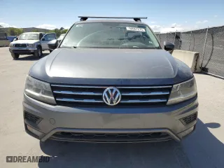 2018 Volkswagen Tiguan S with VIN 3VV1B7AX4JM037328, listed as a Copart auction lot 50067275 with 213,669 mi miles and Clean Title. Bid and sale history available at carsss.com. Image 5.