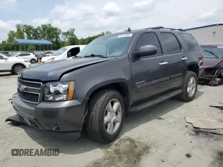 2010 Chevrolet Tahoe LT with VIN 1GNMCBE37AR232932, listed as a Copart auction lot 57213955 with 228,000 mi miles and Salvage title. Bid and sale history available at DreamBid. Image 1.