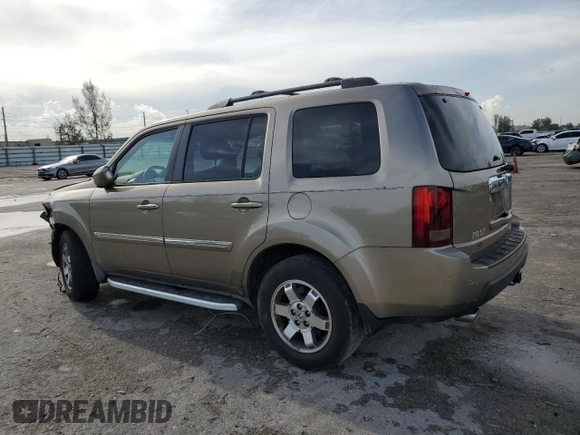 2010 Honda Pilot Touring with VIN 5FNYF3H81AB016255, listed as a Copart auction lot 71052644 with 96,847 mi miles and Salvage Title. Bid and sale history available at DreamBid. Image 2.