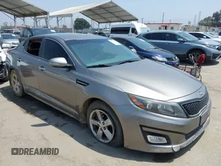 2015 Kia Optima LX z VIN 5XXGM4A72FG483942, wystawiony jako IAAI lot #42374820 z przebiegiem 150 907 mil mil oraz . Historia ofert i sprzedaży dostępna na DreamBid. Obrazek 1.