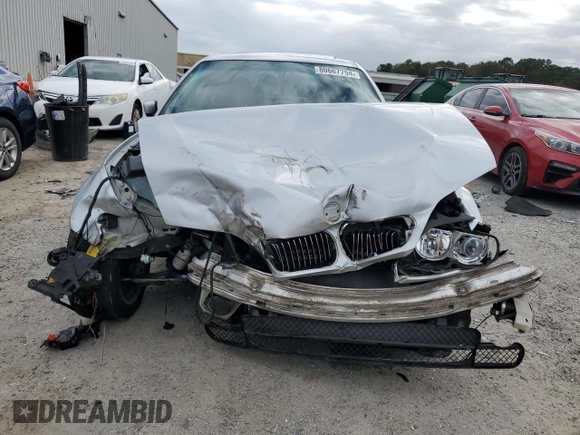 2002 BMW 3 Series 330i with VIN WBAEV53472KM01780, listed as a Copart auction lot 80667794 with 0 mi miles and Salvage Title. Bid and sale history available at carsss.com. Image 5.
