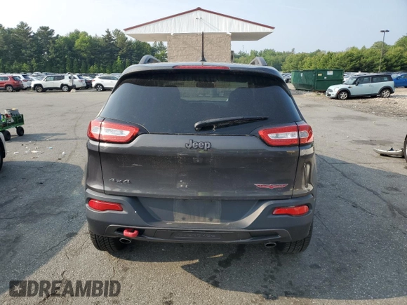 2015 Jeep Cherokee Trailhawk z VIN 1C4PJMBS2FW705132, wystawiony jako Copart lot #59884325 z przebiegiem 100 438 mil mil oraz Szkoda całkowita • Salvage title. Historia ofert i sprzedaży dostępna na DreamBid. Obrazek 6.
