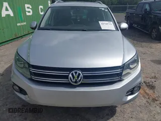 2013 Volkswagen Tiguan S with VIN WVGAV3AX9DW566269, listed as a IAAI auction lot 42728301 with 159,903 mi miles and . Bid and sale history available at DreamBid. Image 6.