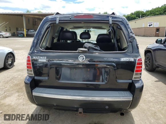 2005 Mercury Mariner Luxury z VIN 4M2CU57185DJ16120, wystawiony jako Copart lot #61803024 z przebiegiem 176 498 mil mil oraz Szkody całkowita. Historia ofert i sprzedaży dostępna na DreamBid. Obrazek 6.