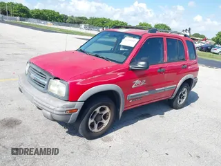 2003 Chevrolet Tracker ZR2 z VIN 2CNBJ734736914220, wystawiony jako IAAI lot #42351611 z przebiegiem 190 578 mil mil oraz . Historia ofert i sprzedaży dostępna na DreamBid. Obrazek 2.