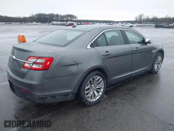 2013 Ford Taurus Limited with VIN 1FAHP2F81DG206437, listed as a IAAI auction lot 41942116 with 194,336 mi miles. Bid and sale history available at carsss.com. Image 4.