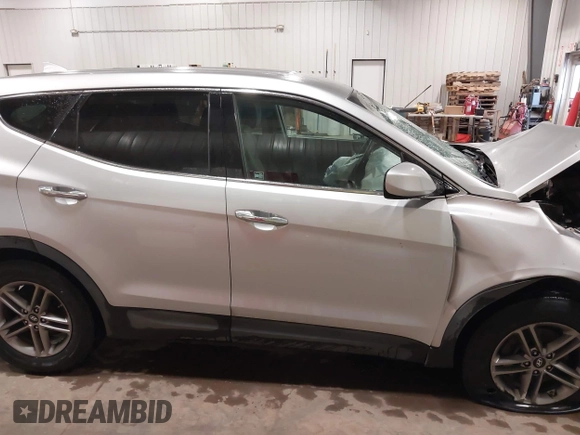 2017 Hyundai Santa Fe 2.4L with VIN 5XYZTDLB3HG488692, listed as a IAAI auction lot 42289211 with 82,290 mi miles and . Bid and sale history available at DreamBid. Image 14.