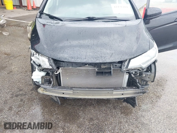 2015 Honda Fit LX with VIN 3HGGK5H56FM760513, listed as a IAAI auction lot 42431169 with 69,841 mi miles and . Bid and sale history available at DreamBid. Image 6.