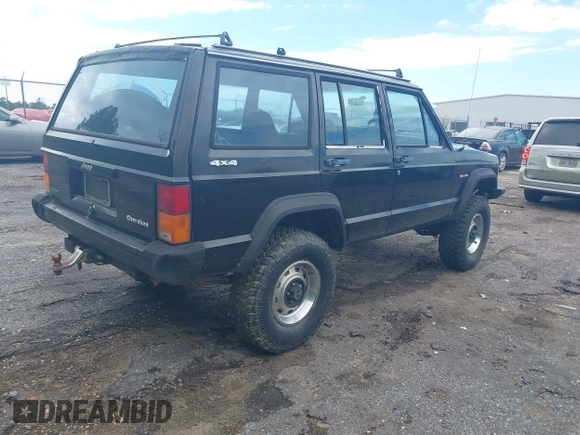 1987 Jeep Cherokee with VIN 1JCMR7819HT174249, listed as a IAAI auction lot 42458110 with 157,683 mi miles and . Bid and sale history available at DreamBid. Image 4.