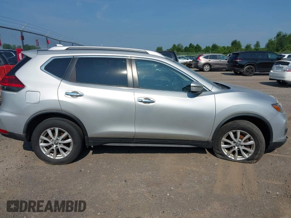 2017 Nissan Rogue S with VIN KNMAT2MV7HP552899, listed as a IAAI auction lot 42659454 with 129,620 mi miles and . Bid and sale history available at DreamBid. Image 13.