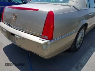 2006 Cadillac DTS w/1SC with VIN 1G6KD57Y26U112518, listed as a IAAI auction lot 42100747 with 122,149 mi miles. Bid and sale history available at carsss.com. Image 6.
