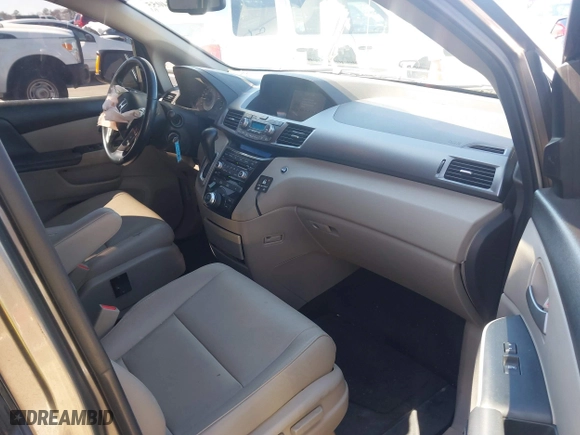 2013 Honda Odyssey Touring with VIN 5FNRL5H96DB066008, listed as a IAAI auction lot 41734055 with 120,292 mi miles. Bid and sale history available at carsss.com. Image 5.