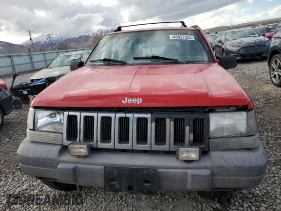 1996 Jeep Grand Cherokee Laredo with VIN 1J4GZ58Y0TC162591, listed as a Copart auction lot 43027025 with 383,318 mi miles and Salvage Title. Bid and sale history available at carsss.com. Image 5.