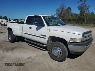 2002 Dodge Ram 3500 with VIN 3B7MF33C42M204856, listed as a Copart auction lot 75734824 with 109,735 mi miles and Salvage Title. Bid and sale history available at carsss.com. Image 4.