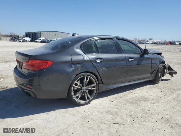 2018 BMW 5 Series M550i xDrive with VIN WBAJB9C5XJB049624, listed as a Copart auction lot 48846695 with 0 mi miles and Salvage Title. Bid and sale history available at carsss.com. Image 3.