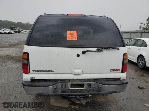 2005 GMC Yukon XL SLE z VIN 1GKEC16Z25J175610, wystawiony jako Copart lot #51051785 z przebiegiem 271 619 mil mil oraz Szkoda całkowita • Salvage title. Historia ofert i sprzedaży dostępna na DreamBid. Obrazek 6.