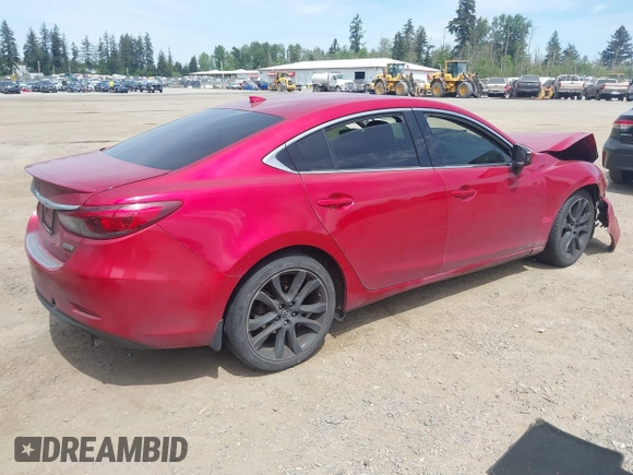 2016 Mazda 6 i Grand Touring с VIN JM1GJ1W52G1403034, выставлен на аукционе IAAI как лот 42238556 с пробегом 141 470 миль миль и . История ставок и продаж доступна на DreamBid. Изображение 4.