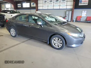 2012 Honda Civic LX z VIN 2HGFB2F59CH313357, wystawiony jako Copart lot #59526905 z przebiegiem 253 322 mil mil oraz Czysty tytuł • Clean title. Historia ofert i sprzedaży dostępna na DreamBid. Obrazek 4.
