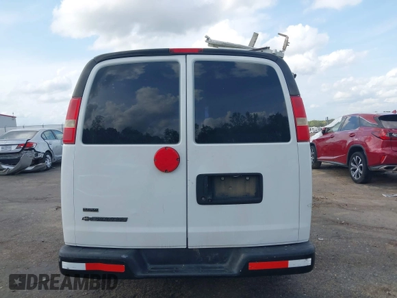 2014 Chevrolet Express Cargo z VIN 1GCSGAFX0E1155518, wystawiony jako IAAI lot #41915742 z przebiegiem 221 712 mil mil oraz . Historia ofert i sprzedaży dostępna na DreamBid. Obrazek 16.
