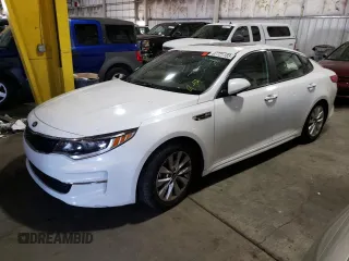 2016 Kia Optima LX with VIN 5XXGT4L30GG002858, listed as a Copart auction lot 74230034 with 83,651 mi miles and Salvage title. Bid and sale history available at DreamBid. Image 1.