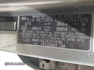 2012 Kia Forte EX with VIN KNAFU4A29C5574316, listed as a IAAI auction lot 42104534 with 195,993 mi miles. Bid and sale history available at carsss.com. Image 9.