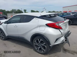 2022 Toyota C-HR XLE z VIN NMTKHMBX2NR144638, wystawiony jako IAAI lot #42063325 z przebiegiem 22 823 mil mil oraz . Historia ofert i sprzedaży dostępna na DreamBid. Obrazek 14.