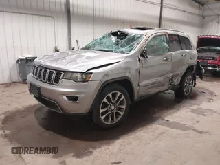 2018 Jeep Grand Cherokee Limited z VIN 1C4RJFBG1JC204615, wystawiony jako IAAI lot #42389992 z przebiegiem 98 335 mil mil oraz . Historia ofert i sprzedaży dostępna na DreamBid. Obrazek 2.