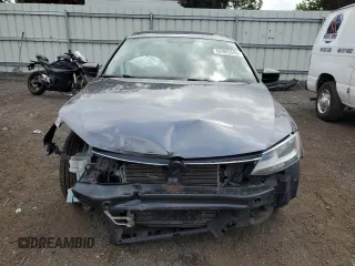2015 Volkswagen Jetta S with VIN 3VW2K7AJ3FM344301, listed as a Copart auction lot 62905595 with 141,419 mi miles and Salvage title. Bid and sale history available at DreamBid. Image 5.