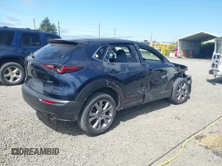 2021 Mazda CX-30 Select with VIN 3MVDMBBL6MM243726, listed as a IAAI auction lot 42353943 with 67,239 mi miles and . Bid and sale history available at DreamBid. Image 4.