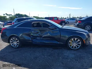 2016 Cadillac ATS Coupe Luxury Collection AWD with VIN 1G6AH1RX6G0109787, listed as a IAAI auction lot 41151839 with 71,573 mi miles. Bid and sale history available at carsss.com. Image 13.