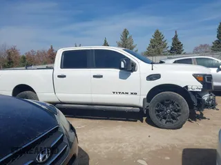 2018 Nissan Titan XD SV with VIN 1N6BA1F40JN523851, listed as a IAAI auction lot 41800730 with 104,527 mi miles. Bid and sale history available at carsss.com. Image 13.