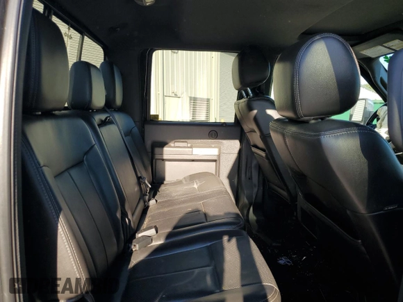 2012 Ford F-350 XL with VIN 1FT8W3B62CEA75083, listed as a Copart auction lot 74129604 with 99,096 mi miles and Salvage title. Bid and sale history available at DreamBid. Image 11.