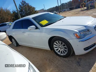 2014 Chrysler 300 with VIN 2C3CCAAGXEH377111, listed as a IAAI auction lot 41329879 with 147,680 mi miles. Bid and sale history available at carsss.com. Image 13.
