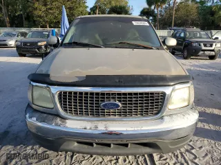 2001 Ford F-150 SuperCrew XLT with VIN 1FTRW07W21KE22048, listed as a Copart auction lot 76839504 with 226,011 mi miles and Clean Title. Bid and sale history available at carsss.com. Image 5.