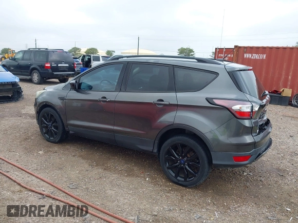2017 Ford Escape SE with VIN 1FMCU0G99HUC65571, listed as a IAAI auction lot 41923517 with 77,179 mi miles and . Bid and sale history available at DreamBid. Image 3.