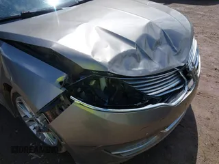 2016 Lincoln MKZ Hybrid with VIN 3LN6L2LU4GR630976, listed as a IAAI auction lot 42160730 with 244,723 mi miles and . Bid and sale history available at DreamBid. Image 6.